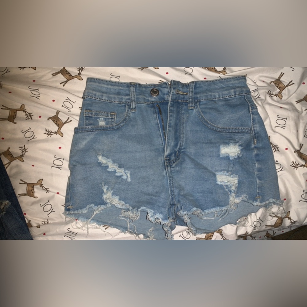 Blue ripped jeans shorts